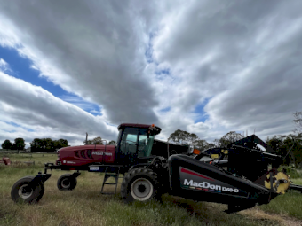 2012 MacDon 155 Windrower with 30ft Front and 35ft Trailer