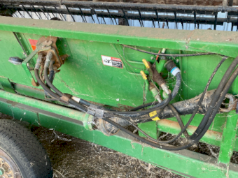 John Deere 930 F 30ft Flex Front on Trailer