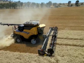 2022 New Holland CR9.90 Header with 2021 MacDon D145 Draper front and 2022 Pickup Front