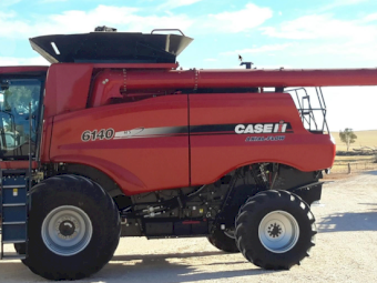 2015 CASE 6140 Axial Flow MacDon FD75 front
