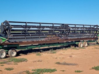 John Deere STS 9670  Bullet Rotor with Mid West 42 Draper front,  Hamilton comb trailer