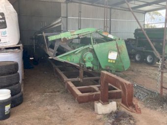 John Deere 925R with Comb Trailer