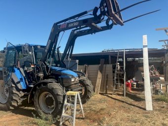 2001 New Holland TL100 Tractor with Loader