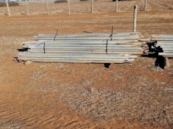 Various Secondhand treated pine posts plus steel strainers
