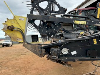 2011 MacDon 150 Windrower with 35ft 2018 D65 Front
