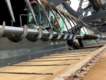 2011 MacDon 150 Windrower with 35ft 2018 D65 Front