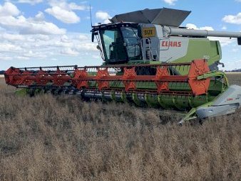 CLAAS Lexion 750TT Header with Front and Trailer