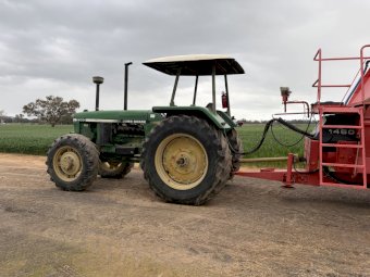 John Deere 3350 Tractor with Kuhn 1460 Euromix II dual horizontal feed mixer