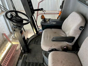 2002 Case 2366 harvester with 30ft 1010 front with pick up reel on 3 axel trailer