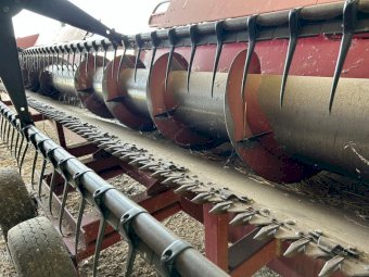 2002 Case 2366 harvester with 30ft 1010 front with pick up reel on 3 axel trailer