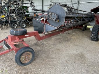 2002 Case 2366 harvester with 30ft 1010 front with pick up reel on 3 axel trailer