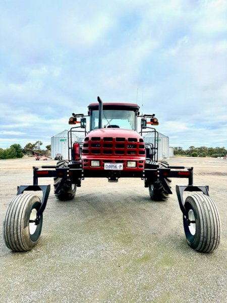 2016 Macdon 205 Windrower with 2018 D65 Front & Mower Front on Trailers