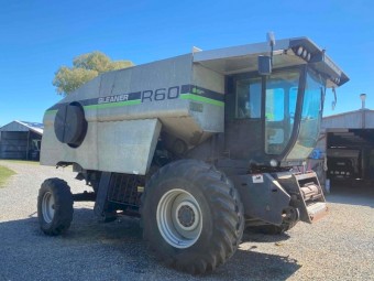 1990 R60 Deutz-Allis Gleaner Header with 27ft front on trailer