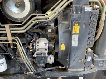 Case IH MXM130 PRO with LSX Front End Loader with Hay Forks & Bucket included