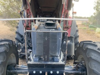 Case IH MXM130 PRO with LSX Front End Loader with Hay Forks & Bucket included