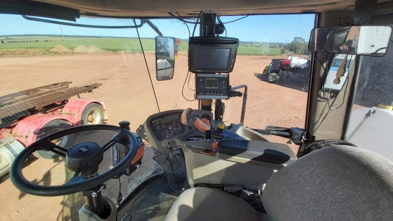 2010 MacDon M150 Windrower