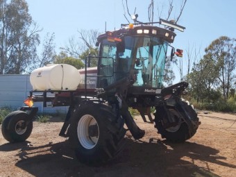 2010 MacDon M150 Windrower