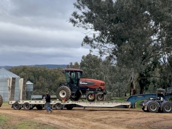 MacDon M150 Windrower with 30ft D60 Front