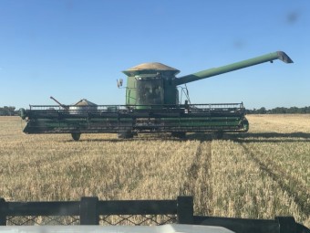 John Deere 9860 Header with 36ft Front and Trailer