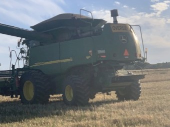 John Deere 9860 Header with 36ft Front and Trailer