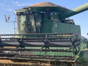 John Deere 9860 Header with 36ft Front and Trailer