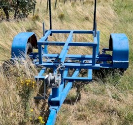 Round hay bale trailer