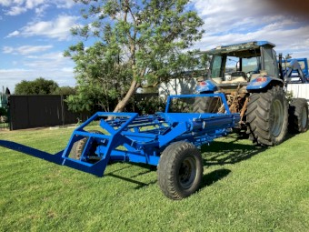 Round Bale Feed Out Machine