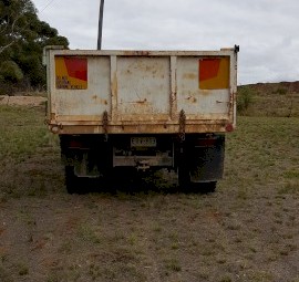 Green Tipper body truck