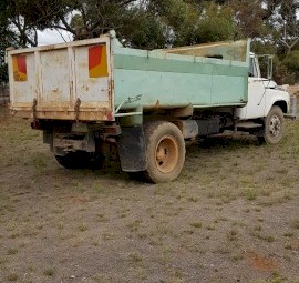 Green Tipper body truck