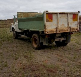 Green Tipper body truck
