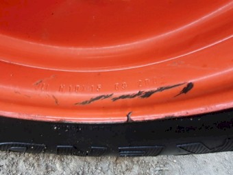 Set of used turf tyres and rims from a Kubota L3540
