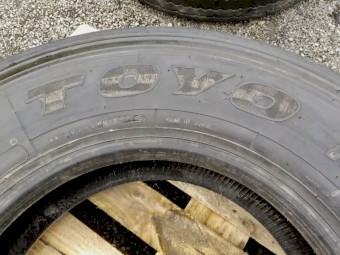 1 x Olympic Trojan and 1 x Toyo Tyre