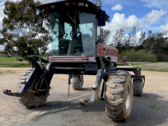 2002 9352 premier windrower with MacDon 972 Draper front, countrywide vertical knives, trailer and carrier