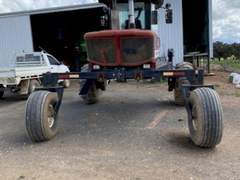 2002 9352 premier windrower with MacDon 972 Draper front, countrywide vertical knives, trailer and carrier