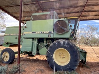 John Deere 7720 and heavy duty 30’ bat front
