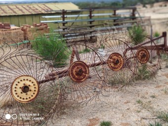 Four wheel hay rake