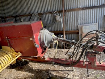 New Holland 575 Small Square Baler and Rebel 15 Bale Accumulator