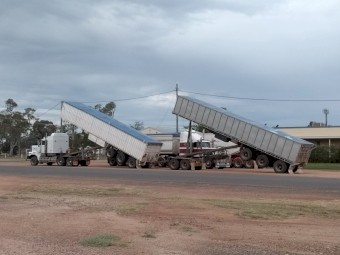 Tipping axle convertible grain trailers 1986 O’phee (grey) and 1986 Lusty (white) on spider spring suspension 