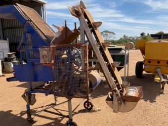 Garlic clove sizer and cleaner