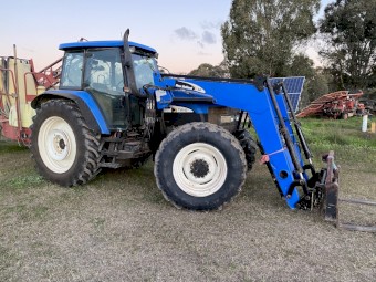 2002  New Holland TM140 with Loader