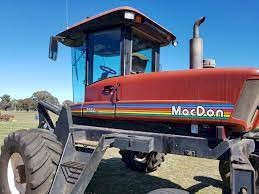 WANTED Macdon 9352 + 30ft front or similar