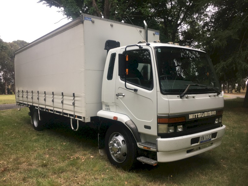 1999 Mitsubishi FK618 Curtain Sider Rigid with Tail Gate. PRICE IS NEGOTIABLE