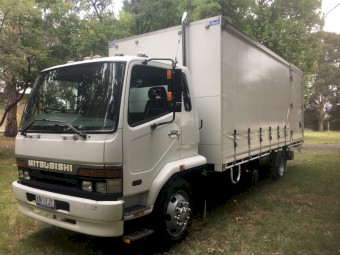 1999 Mitsubishi FK618 Curtain Sider Rigid with Tail Gate. PRICE IS NEGOTIABLE