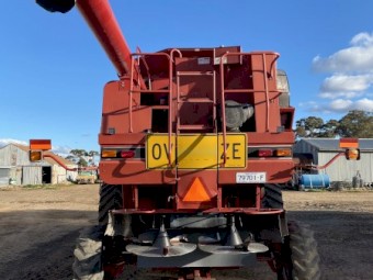 2003 Case IH 2388 X-Clusive with a case 2142 Draper front
