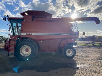 2003 Case IH 2388 X-Clusive with a case 2142 Draper front
