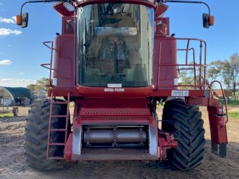 2003 Case IH 2388 X-Clusive with a case 2142 Draper front