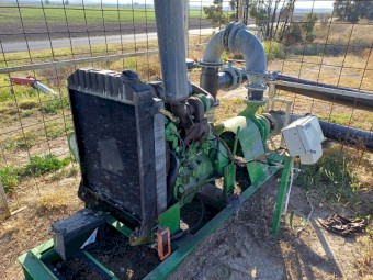 John Deere engine, pump, Generator, shed, fuel tank and all above ground plumbing.