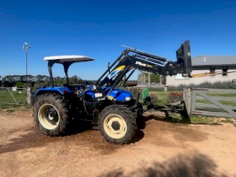 2012 New Holland TT75 with FWA and Challenge Front Loader
