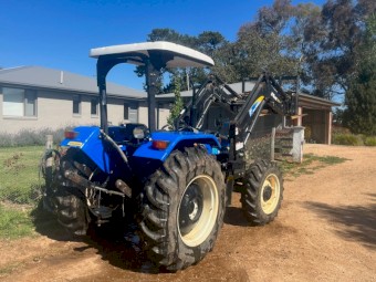 2012 New Holland TT75 with FWA and Challenge Front Loader