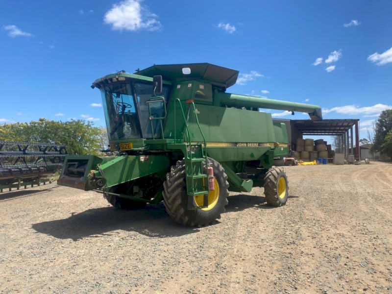 1996 John Deere CTS Header with 30ft Tin Front and Comb Trailer